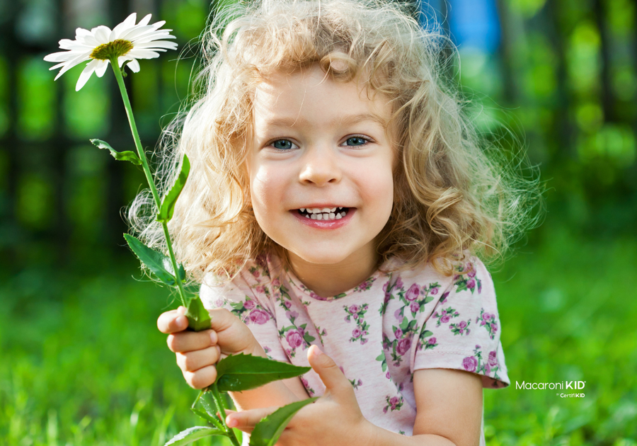color hunt for kids -- how to do a color hunt for kids -- girl holding white flower